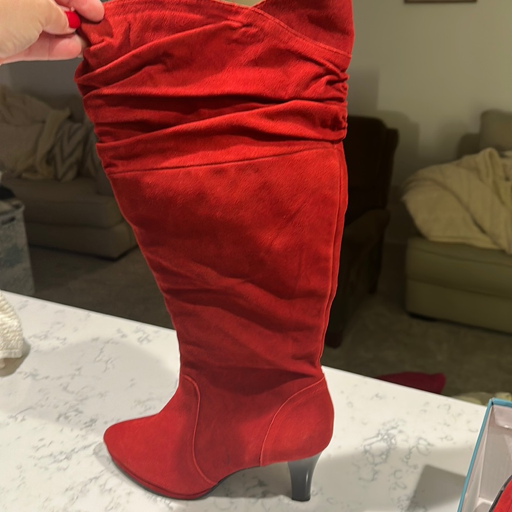 Knee high red boots